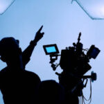 Video or film production studio used in shooting videography or photography and photo sets. Professional movie camera and film crew team making film scenes for cinema TV or online advertising works.